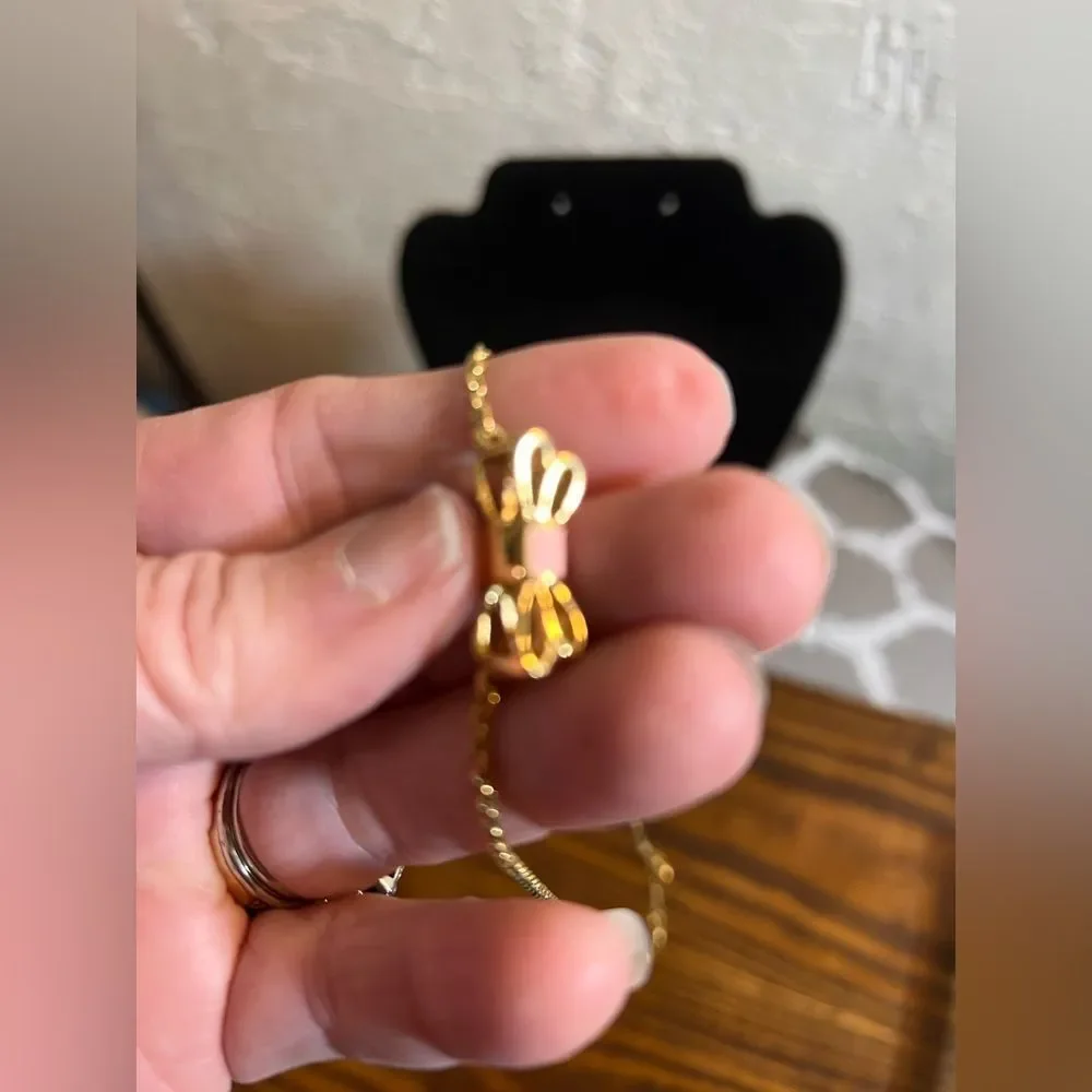 Kate Spade Pink and Gold Bow Necklace gold tone with pink enamel bow feminine